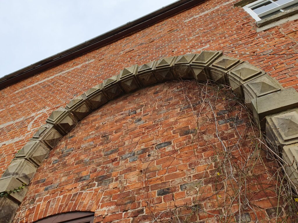 The monumental Renaissance arch at Bach-y-Graig, adorned with rhombic dodecahedrons