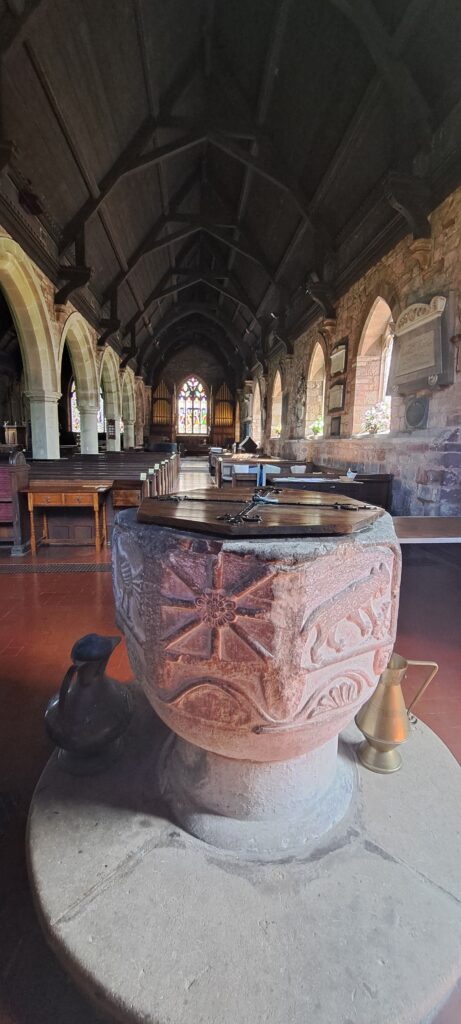 Romanesque font in Hodnet Church, said to be C17th