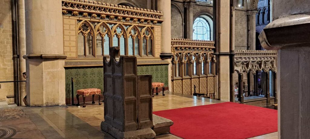 The throne of St. Augustine's Abbey, where Matthew Parker was reluctantly dragged to become Archbishop of Canterbury. Despite his initial hesitation, Parker played a crucial role in shaping the English Reformation.