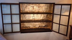 a gold guilded book safe in the studiolo