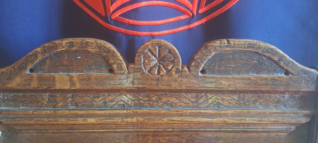 The dance and barley chevrons seen on the top of the Sir Rowland Hill chair.