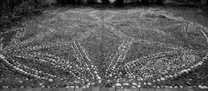 a black and wite image of a pavement of cobels showing how to do a danced