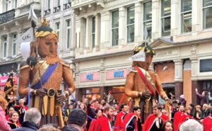 Gog and Magog, the traditional guardians of the City of London, and they have been carried in the Lord Mayor's Show since the reign of Henry V.