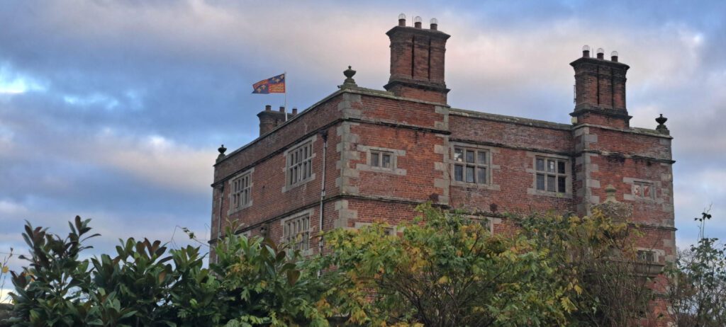 Banner of Arms of Shrewsbury School flying on Soulton Hall