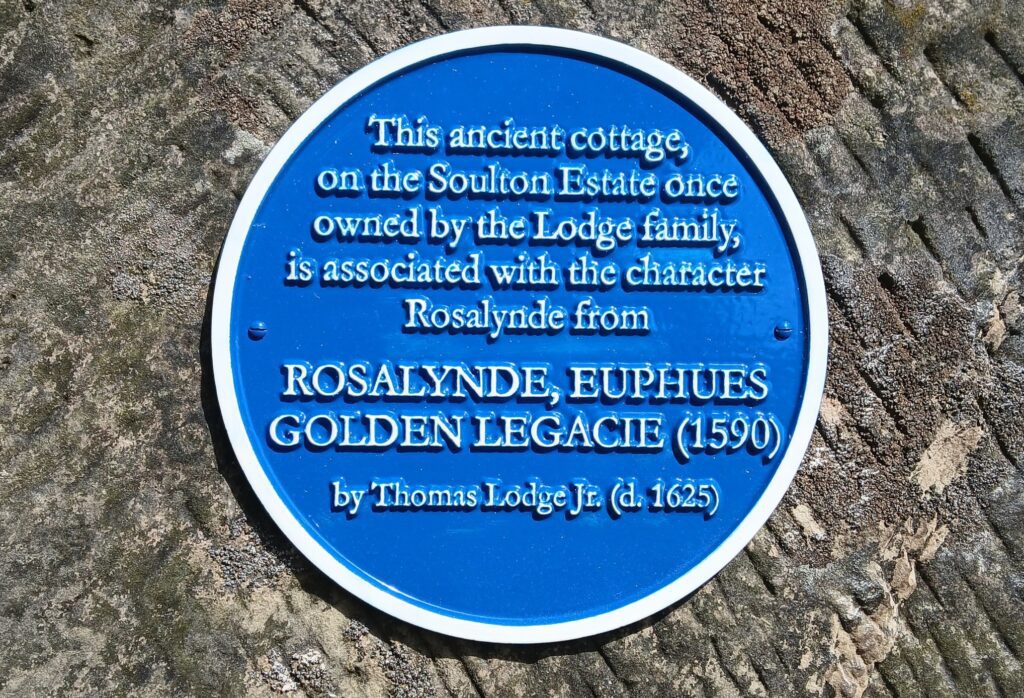 Blue plaque on the cottage in the AS YOU LIKE IT wood