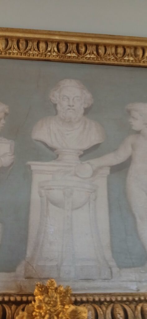 Classical figure above the fireplace in the Berrington Hall Library