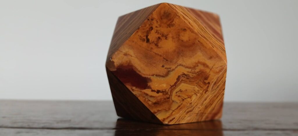 A perfect visual aid! This donated marble cube-octahedron shows how these shapes relate to the rhombic dodecahedron – a key part of the 'garnet code' in Renaissance architecture and beyond.