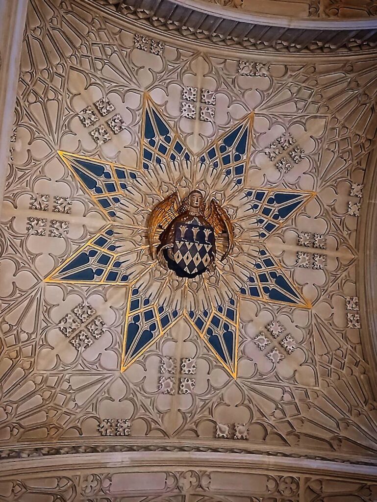 The chantry chapel and tomb of William of Waynflete, Bishop of Winchester, distinguished by its intriguing carvings.