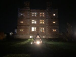 Soulton Hall at night from Epidaurus Court