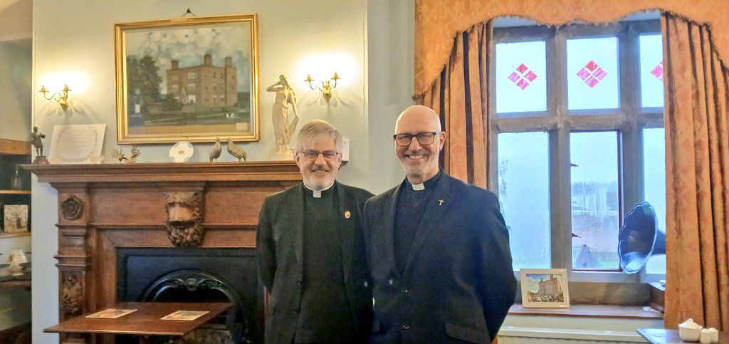 The Venerable Luke Miller DL, Archdeacon of London, with Reverend Jukes of Ss Peter and Paul, Wem, following the 2025 St Ekrenwld service at Soutlon Hall.