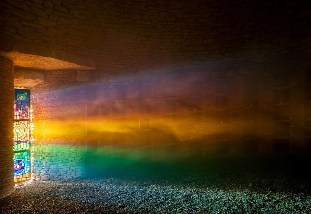 2025 Winter Solstice light in Soulton Log Barrow (Copyright Andrew Fusek Peters)