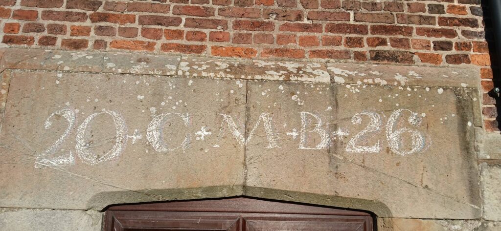 Epiphany maked in chalk over a 'lost' door