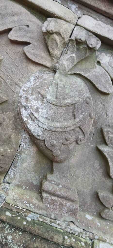 Etched into the Wren steps, this 1688 carving transforms the ancient reliquary tradition into a permanent architecture of devotion, where two hearts remain forever guarded by the stone.