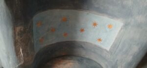 8 pointed stars abvove the chapel's altar