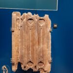 This fragment of linenfold paneling, a common decorative style in Tudor interiors, features incised crosses that underscore how, in the early modern period, there was no separation between material objects and expressions of belief, as every aspect of daily life remained woven into the fabric of faith.