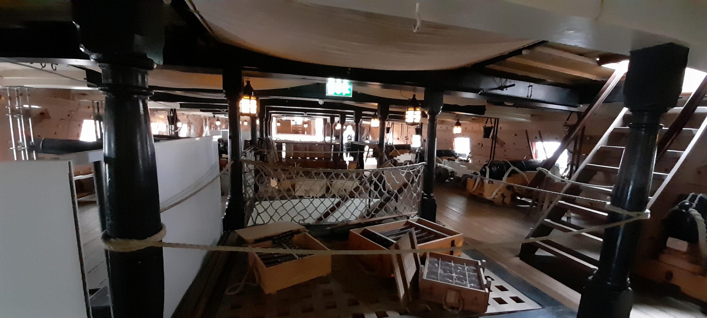 The cramped quarters of the gun decks stood in stark contrast to the stern cabins, with hundreds of men living, eating, and sleeping slung a mere 16 inches apart amidst the heavy weaponry.