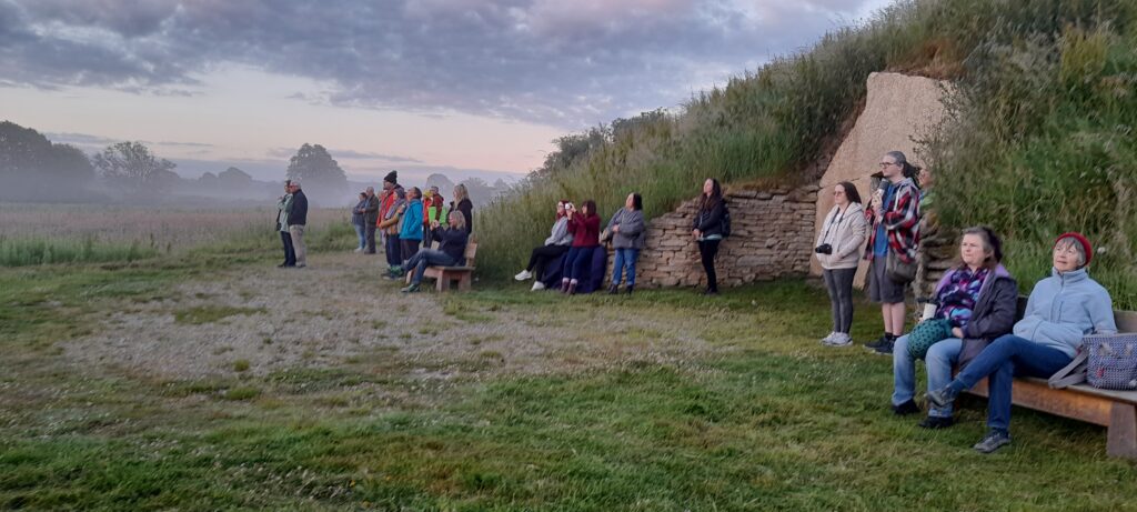 A quiet moment of reflection at Soulton Long Barrow as the local community comes together for the tenth annual midsummer dawn.