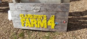 Sign at Clarkson's Farm: with signing from visitors